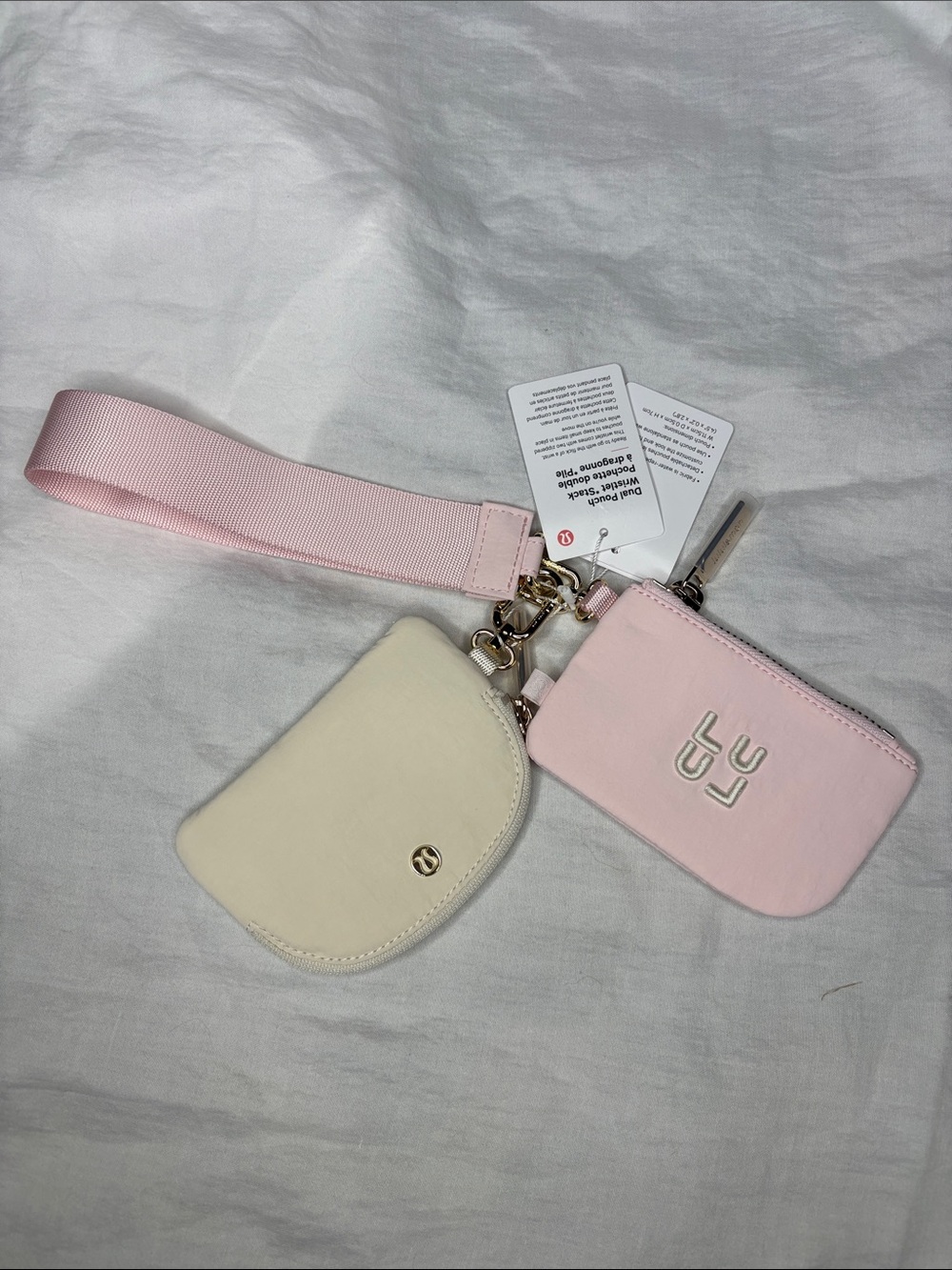 NWT Lululemon Dual Pouch Wristlet Stack
Pink Pearl/Light Ivory/Gold - Picture 1 of 2